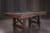 The Nora Slate Pool Table in Brown Wash styled in a warm, inviting entertainment space, capturing the essence of farmhouse charm. Featuring a premium slate playfield and a solid wood frame, this table is designed for gatherings, game nights, and timeless enjoyment. Optional dining top transforms it into a functional dining space. Available at Sawyer Twain.