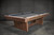 Top-angle view of the Nixon Billiards Kai Slate Pool Table's professional-grade 1-inch slate surface, designed for precision billiards gameplay.