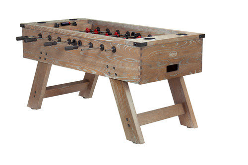 The Barren Foosball Table by Legacy Billiards showcased in a contemporary game room setting. This image highlights the table’s premium craftsmanship, customizable finishes, and seamless integration with Legacy's Rustic Series pool and shuffleboard tables.