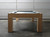 Handcrafted Paula Parsons Slate Pool Table in Glazed Maple, highlighting leather drop pockets, smooth maple wood finish, and mother of pearl billiard inlays.