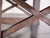 Close-up of the farmhouse-style legs on the Nora Slate Pool Table in Brown Wash. Crafted from solid wood, these legs feature a classic, sturdy design that complements the rustic farmhouse aesthetic. The table’s legs provide both support and timeless charm, making it a standout piece in any home. Available exclusively at Sawyer Twain.

