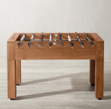 Side profile of the Brunswick Teak Foosball Table showcasing its solid teak construction, sturdy legs, and precision-engineered player rods for smooth and controlled gameplay.