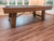 The Isaac table featured in a coastal-inspired home with light, airy finishes and neutral textiles. Its Silvered Ash wood tones blend effortlessly with soft palettes, making it a natural fit for elevated beach houses and high-end vacation properties.