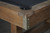 Close-up of the genuine leather drop pockets on the Bryant Slate Pool Table, adding a classic touch to the rustic Weathered Natural finish.