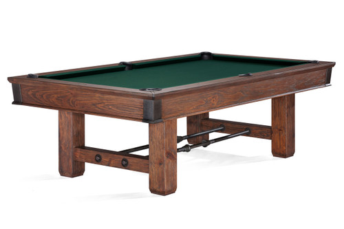 Showcasing the Brunswick Canton Slate Pool Table in the featured Black Forest finish, this hero angle highlights the industrial design details including aged metal turnbuckles, exposed corner brackets, and hand-hammered sights. Set against a clean white background, it gives a clear look at the table’s rugged character and rich slate playfield—perfect for interior designers and high-end shoppers seeking bold, architectural game room furniture.