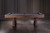 A long view of the Nora Slate Pool Table in Brown Wash, set in a stylish lifestyle environment. This shot captures the full length of the table, showcasing its spacious playing surface and rustic contemporary design. The table's solid wood construction and warm brown wash finish are highlighted against a modern farmhouse game room backdrop. Ideal for both casual games and competitive play, the Nora Pool Table is designed to bring family and friends together. Available exclusively at Sawyer Twain, with optional dining top and matching accessories.

