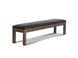 Nixon Billiards Storage Bench shown at a ¾ angle on a clean white background. The bench features a solid hardwood frame in Weathered Natural finish with a black synthetic leather cushioned seat, ideal for upscale game rooms. Available now at SawyerTwain.com.