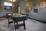 Corner Kick table staged in a stylish home lounge or office rec space, emphasizing its minimal footprint and modern aesthetic.