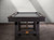Plank & Hide Isaac Pool Table in Distressed black and golden brass turnbuckles.