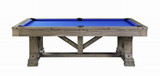 Top-down view of the Cross Creek table styled for play with Championship felt, cue balls racked, and accessory kit displayed nearby.