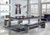 Playcraft Monaco Slate Pool Table with dining top in place, styled as a modern dining setup in a contemporary home interior