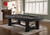 The Rio Grande in Weathered Raven staged in a modern game room with dark finishes, industrial lighting, and leather accents for an elevated rustic-meets-urban vibe.