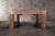 This image provides a full-width view of the Alta Slate Pool Table’s rectangular Parsons-style legs, finished in warm Honey Ash. The wide-set base emphasizes the table’s architectural symmetry and grounded presence, making it ideal for modern interiors that value clean lines and furniture-grade construction. The sleek ash wood structure brings both stability and subtle elegance to this Sawyer Twain exclusive.