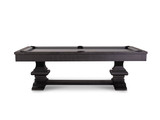A full profile view that highlights the linear grain of the pine wood and the architectural presence of the table’s solid structure.