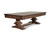 This angled view presents the table with its dining top installed, combining rustic charm with elevated functionality. It emphasizes the convertible design and stunning finish detail.