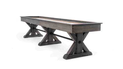 Otis Shuffleboard Table by Plank & Hide in Weathered Grey finish shown from a 3/4 angle on white background — a rustic-contemporary centerpiece handcrafted with a solid maple playfield.

