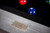 A crisp detail shot capturing the brushed steel American Heritage Billiards logo plate affixed to the frame of the Vancouver Slate Pool Table in Gray Marble. This subtle branding moment reinforces the table’s legacy craftsmanship and Sawyer Twain exclusivity. Perfect for search queries like “American Heritage logo detail on pool table,” “authentic branding modern billiards table,” or “designer slate pool table with logo badge close-up.”