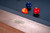 A polished, overhead lifestyle image showing the Sawyer Twain Trophy Kit pool balls perfectly racked on the Vancouver Slate Pool Table’s playing surface. The vibrant colors and premium finish of the Trophy Kit set contrast beautifully with the custom felt and Honey Ash finish—visually bold, game-night ready, and unmistakably Sawyer Twain. Designed for queries like “luxury pool balls set on designer table,” “Trophy Kit billiard balls styled photo,” or “exclusive Sawyer Twain pool table setup with premium accessories.”