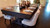 Lifestyle photo of the Otis Slate Pool Table with dining top on, styled for a holiday dinner with formal dining chairs and seasonal décor, showcasing its dual-purpose use in a modern farmhouse interior