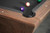 Nixon Billiards Kai Pool Table in Grey Walnut featured in a modern game room, perfectly illustrating its versatile design and elegant presence within home decor.
