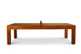 In an elegant, modern game room, the Buckhead Table Tennis by Venture Shuffleboard stands out as a designer ping pong table that elevates interior spaces. Exclusively available at Sawyer Twain USA, this image captures a lively match, emphasizing the table's fusion of competitive performance with sophisticated, interior design-inspired aesthetics.