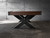 Detailed close-up of the industrial black steel X-legs under the Portland’s solid wood cradle. Captures the structural strength and bold design signature of Nixon Billiards’ craftsmanship.