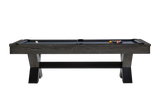 Profile view capturing the sleek matte black legs and charcoal wood rails. This shot emphasizes the table’s streamlined silhouette and structural presence.